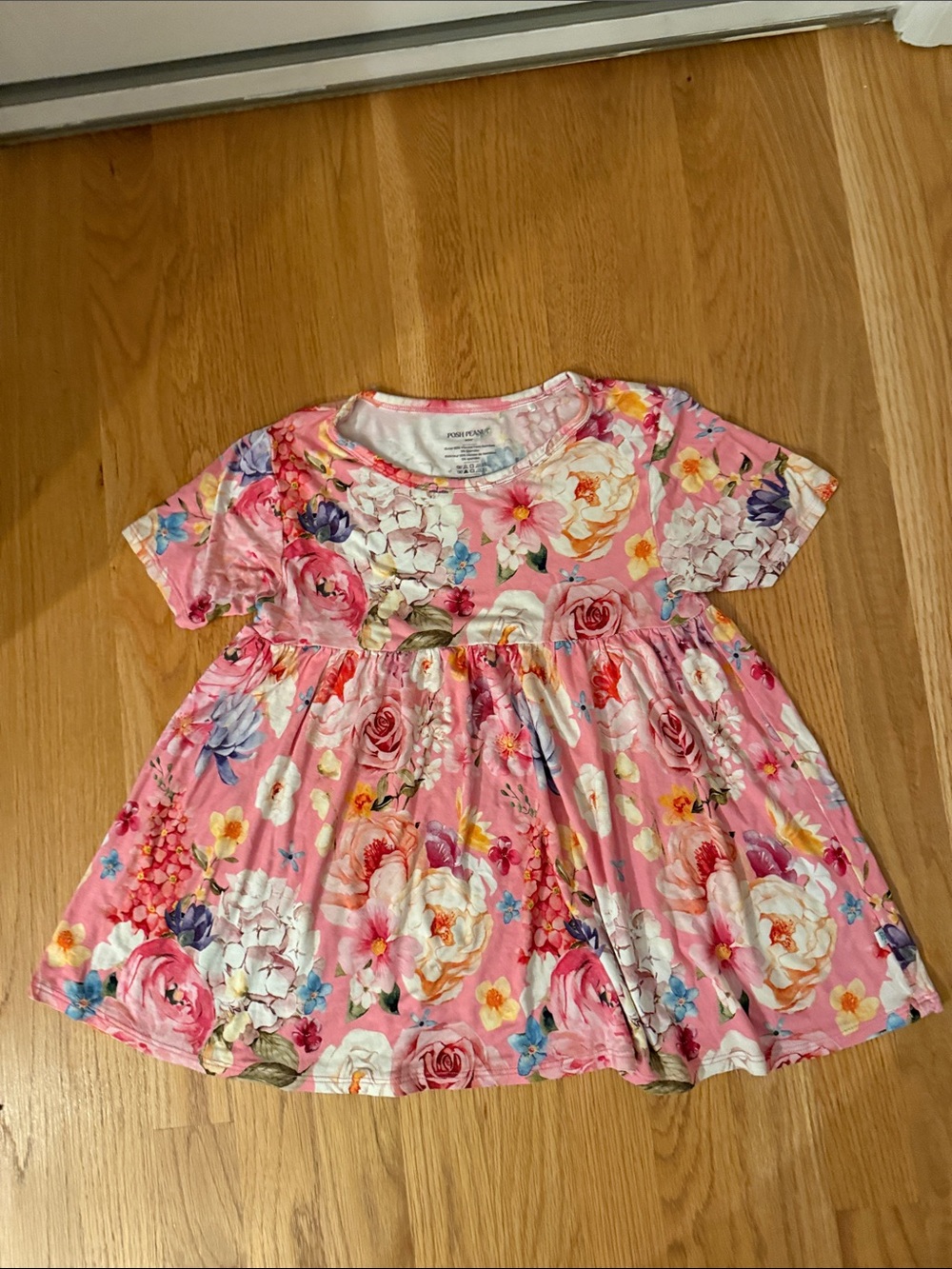 Posh Peanut Pink Floral Knit Twirl top with Multicolor Blooms